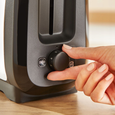 Тостер Tefal Subito 1100Вт, розморожування, щипці, нерж. сталь, чорний Тостер Tefal Subito 1100Вт, розморожування, щипці, нерж. сталь, чорний