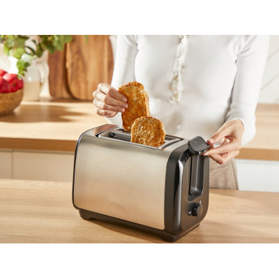 Тостер Tefal Subito 1100Вт, розморожування, щипці, нерж. сталь, чорний Тостер Tefal Subito 1100Вт, розморожування, щипці, нерж. сталь, чорний