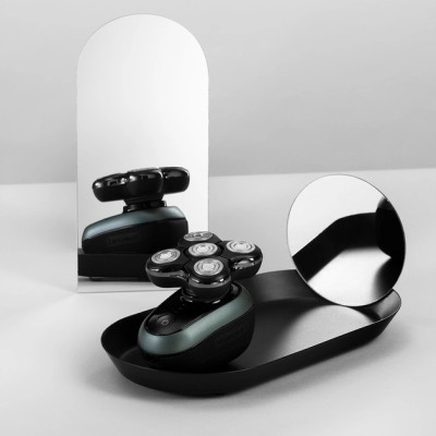 Бритва електр. для голови Remington роторна Ultimate Series RX7,  бритв.головок-5, Li-Ion, сух.+волог., тример, чорно-зелений