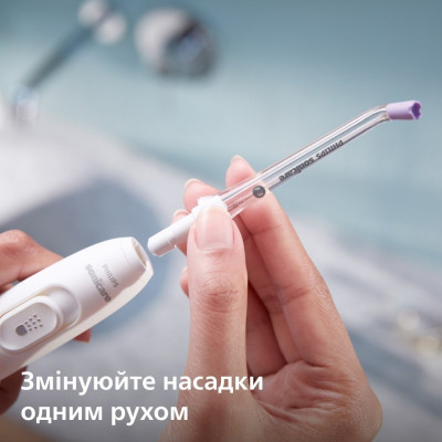 Іригатор Philips стаціонарний Sonicare Philips Sonicare Power Flosser 7000, чаша 600 мл, від мережі , чохол, 4 насадки , білий