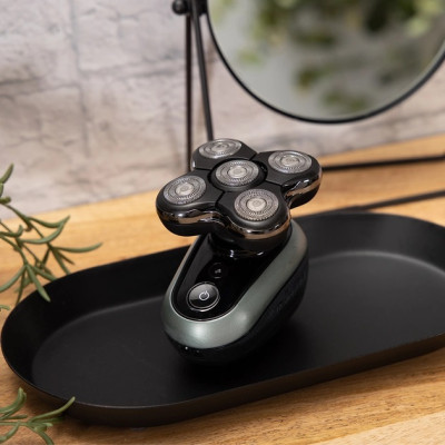 Бритва електр. для голови Remington роторна Ultimate Series RX7,  бритв.головок-5, Li-Ion, сух.+волог., тример, чорно-зелений